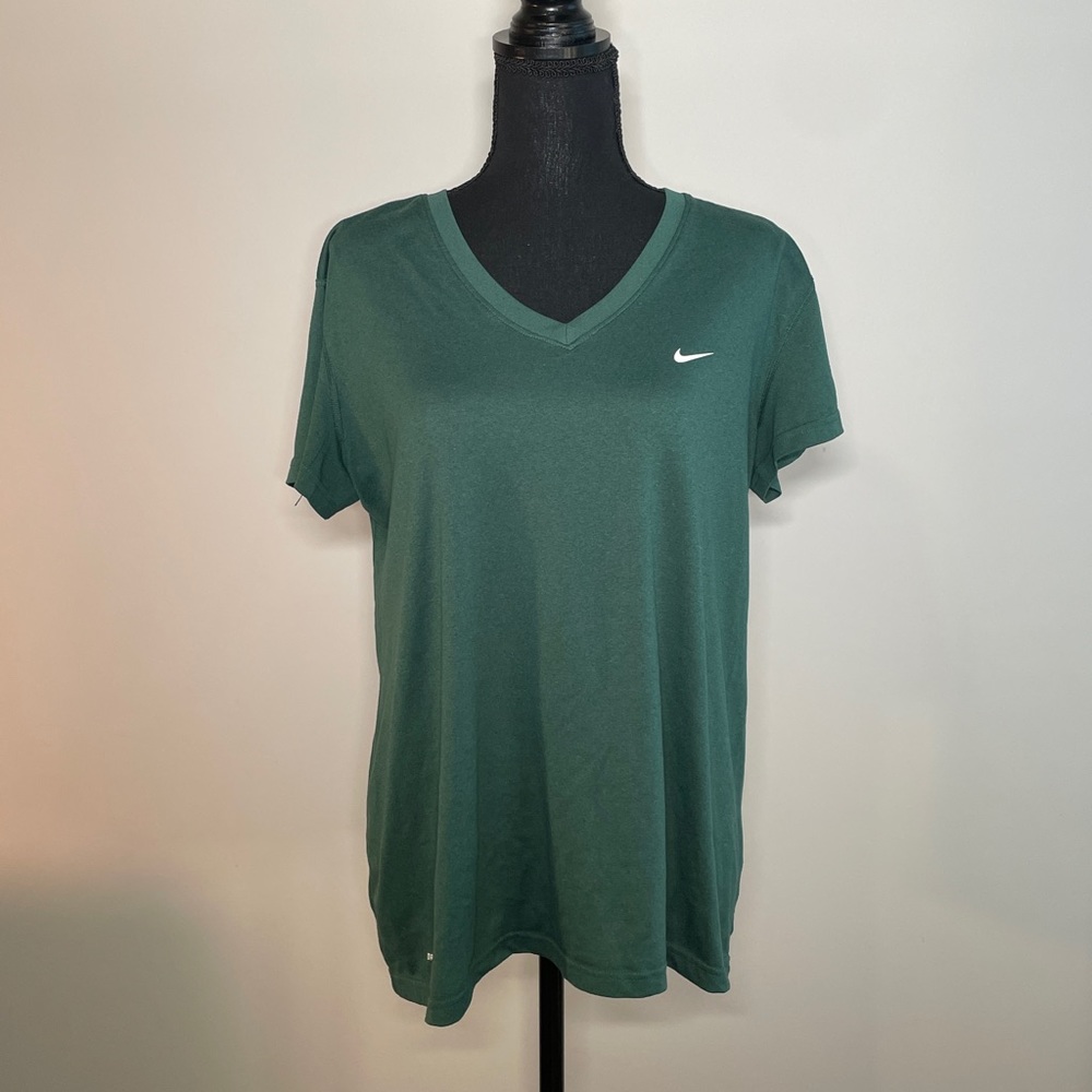 Dark green Nike athletic shirt in a size XL.